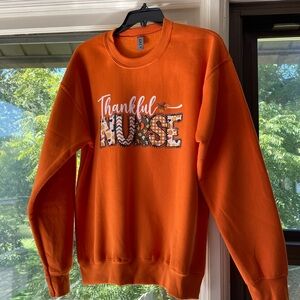 Vibrant Orange Thankful Nurse Sweatshirt